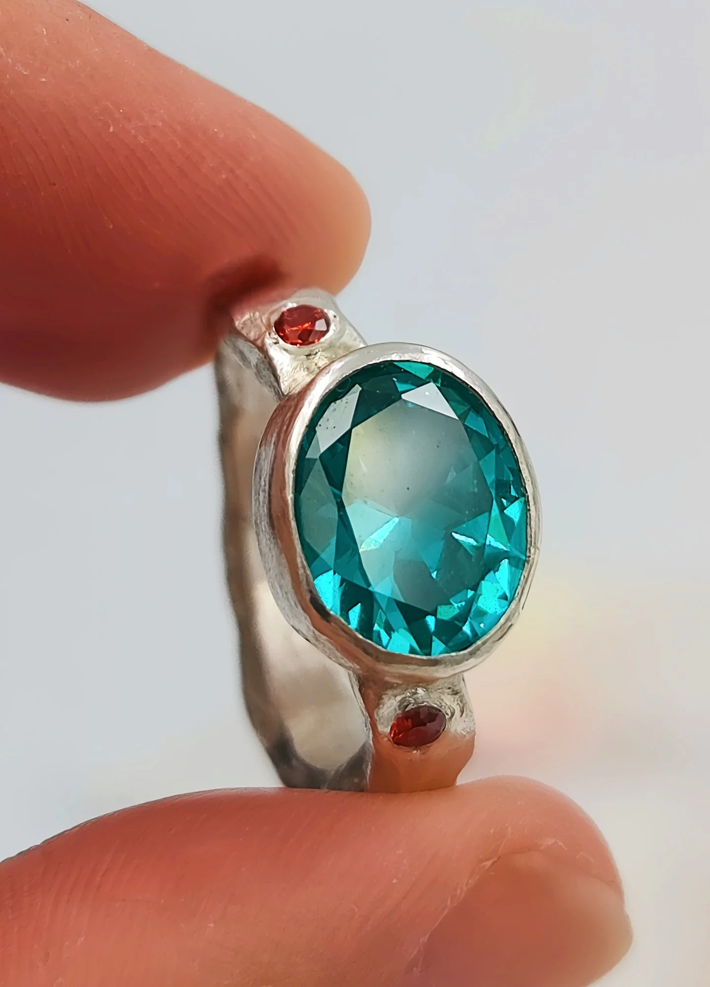 Hand-Forged Sterling Silver Ring with Oval Blue YAG Gemstone