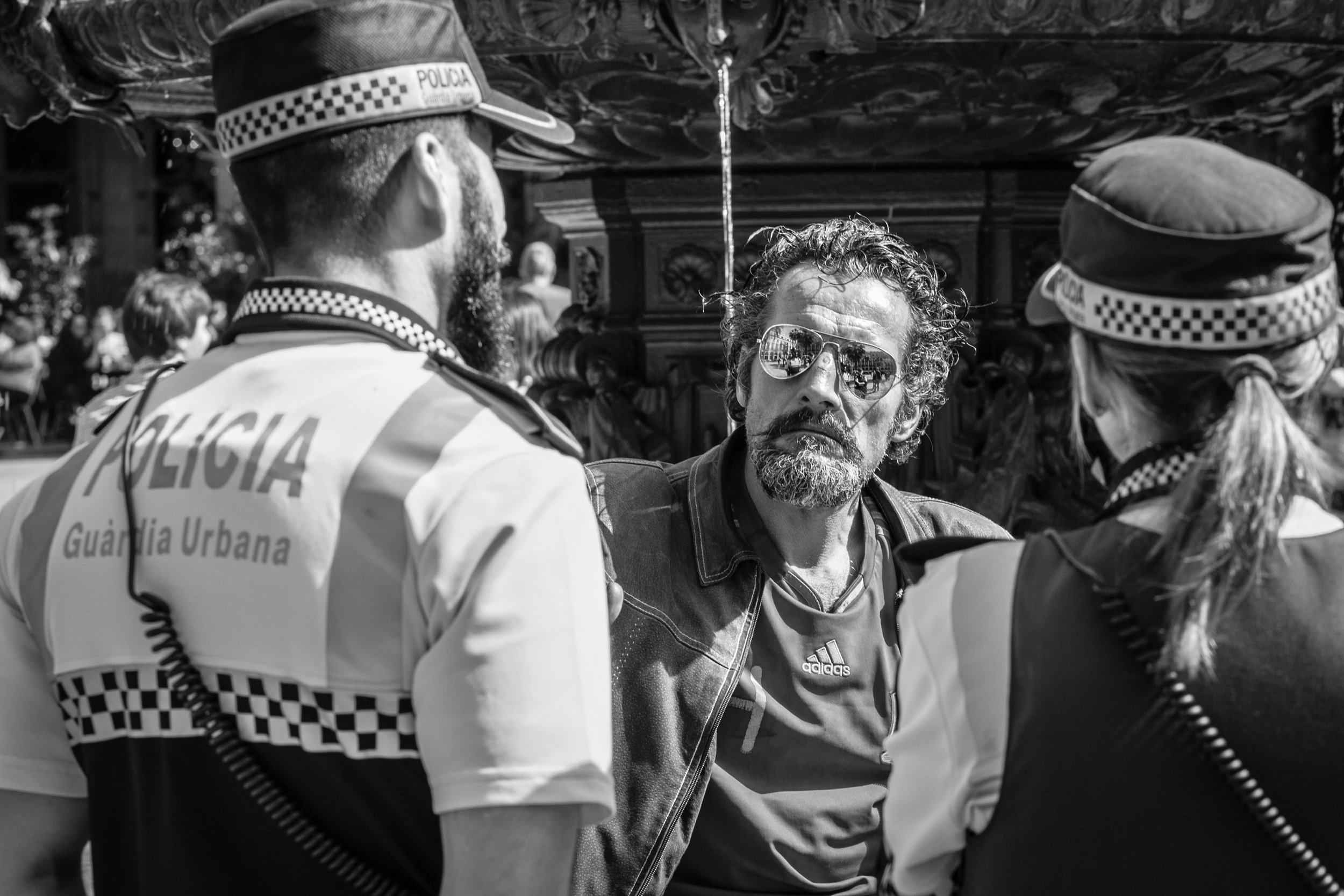 Police arrest a man in Barcelona.