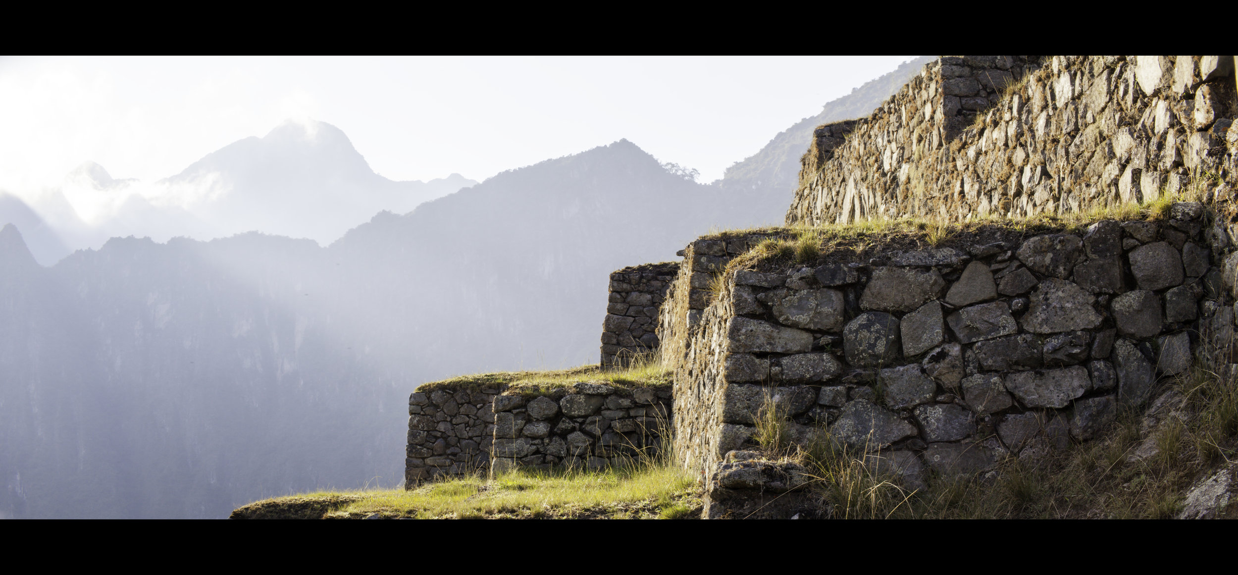 A cinematic photo of Machu Picchu in South America.