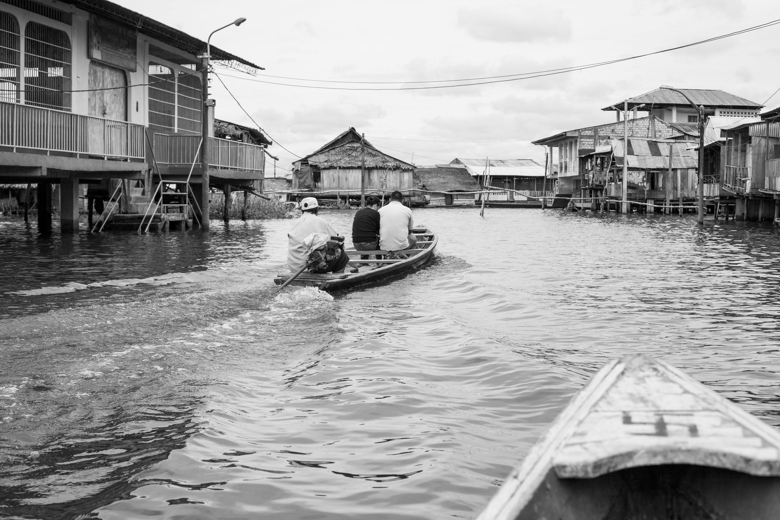 Travelling by canoe in Iquitos, Peru.