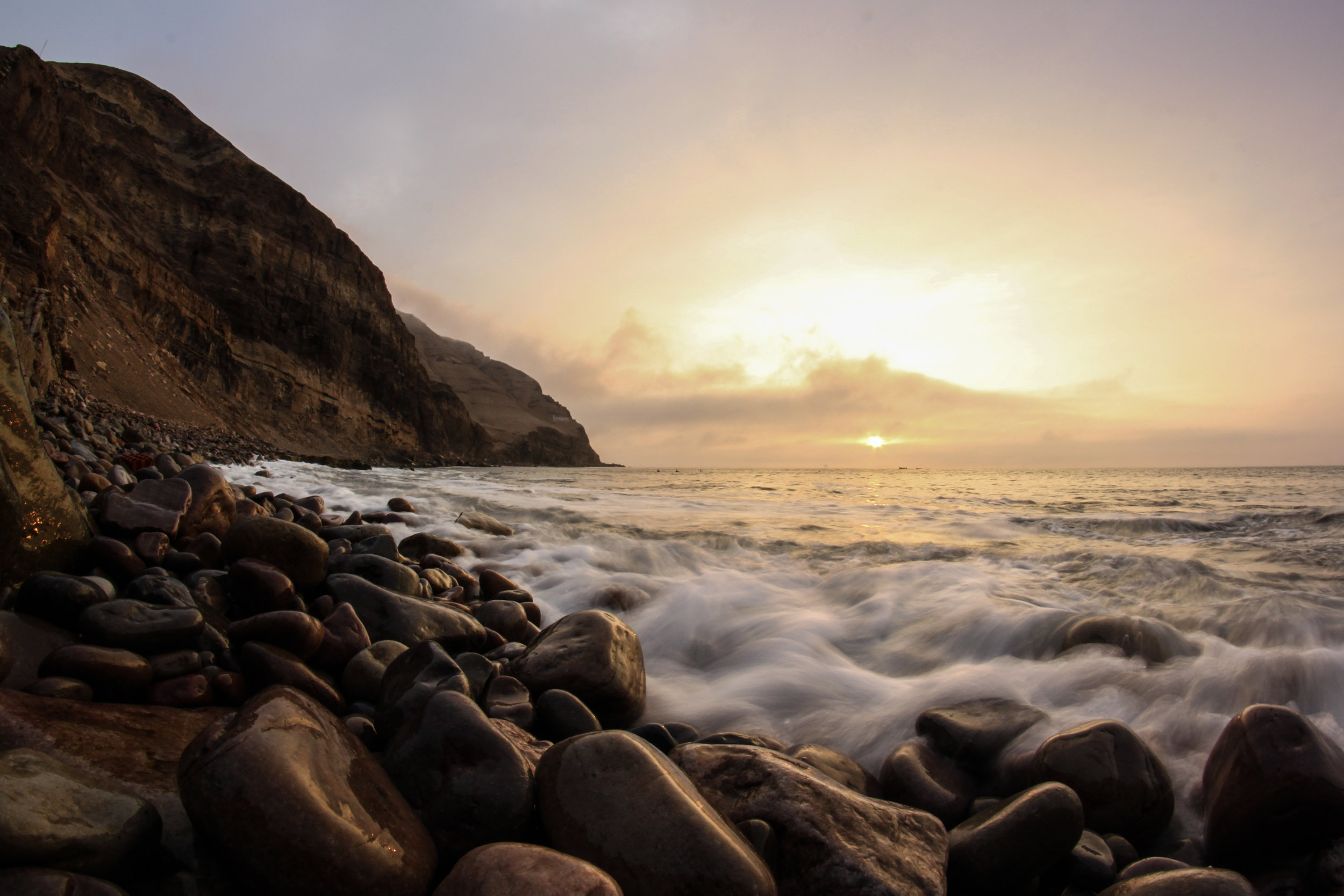 A long exposure sunset photo of La Herradura beach in Chorillos, Lima, peru.