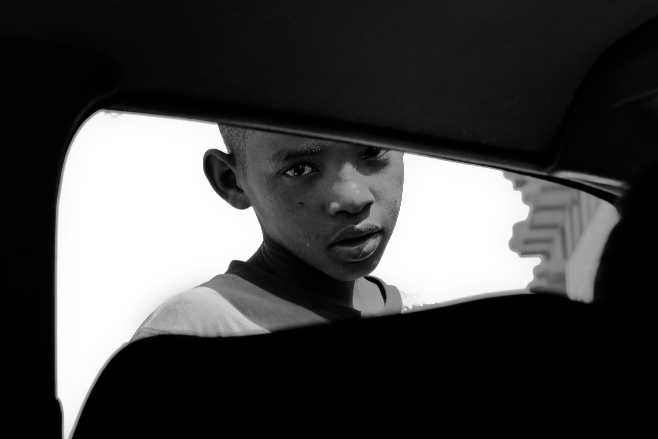 An African portrait using the compositional technique of a frame within a frame.