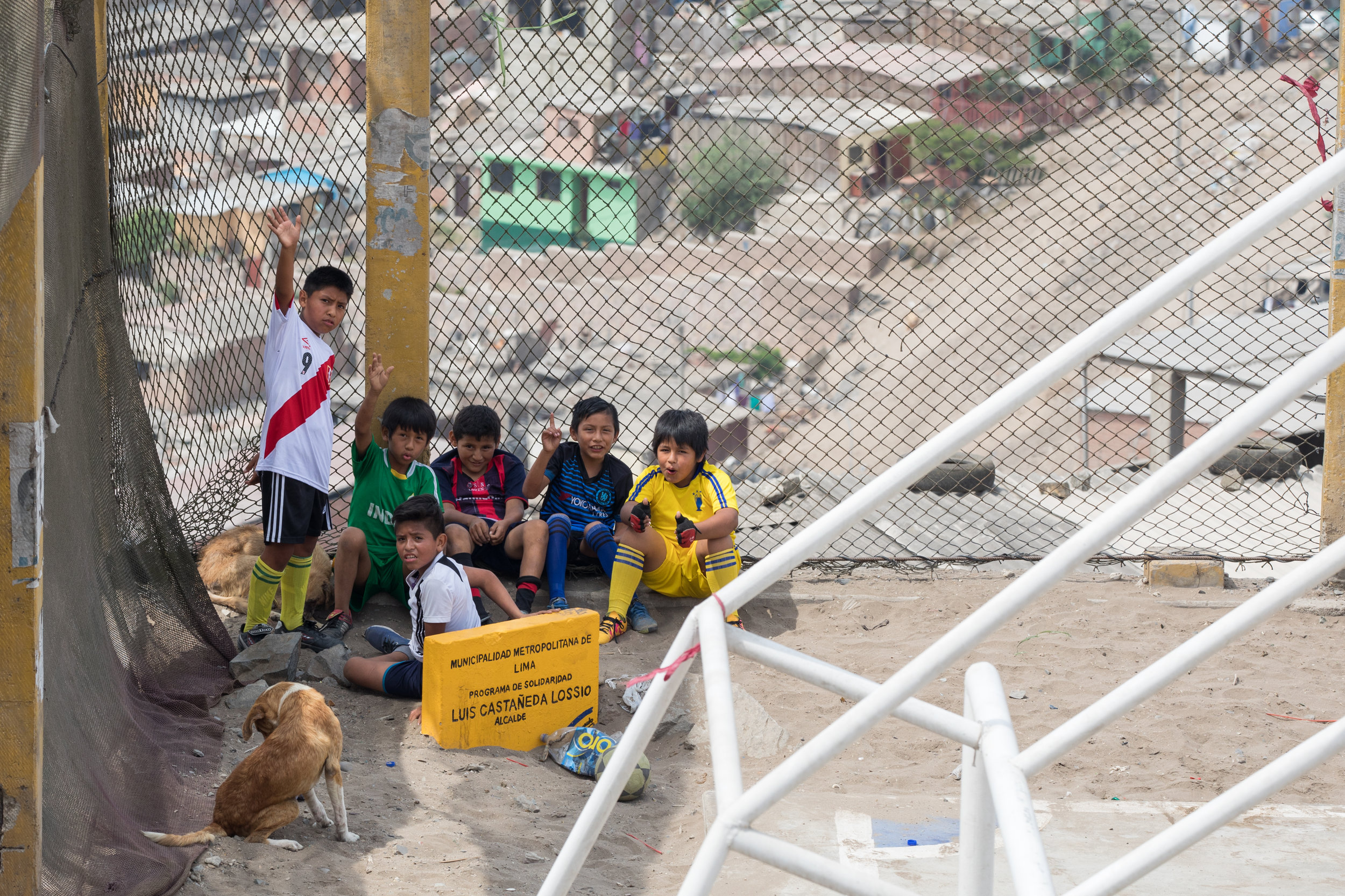 Peru's future football stars taking a break from the game in San Juan de Miraflores, Lima, Peru.