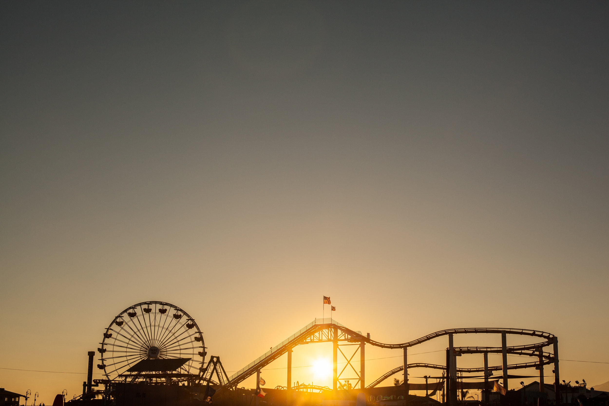 An artistic photo of the rollercoaster at Santa Monica Pier in California by Geraint Rowland.