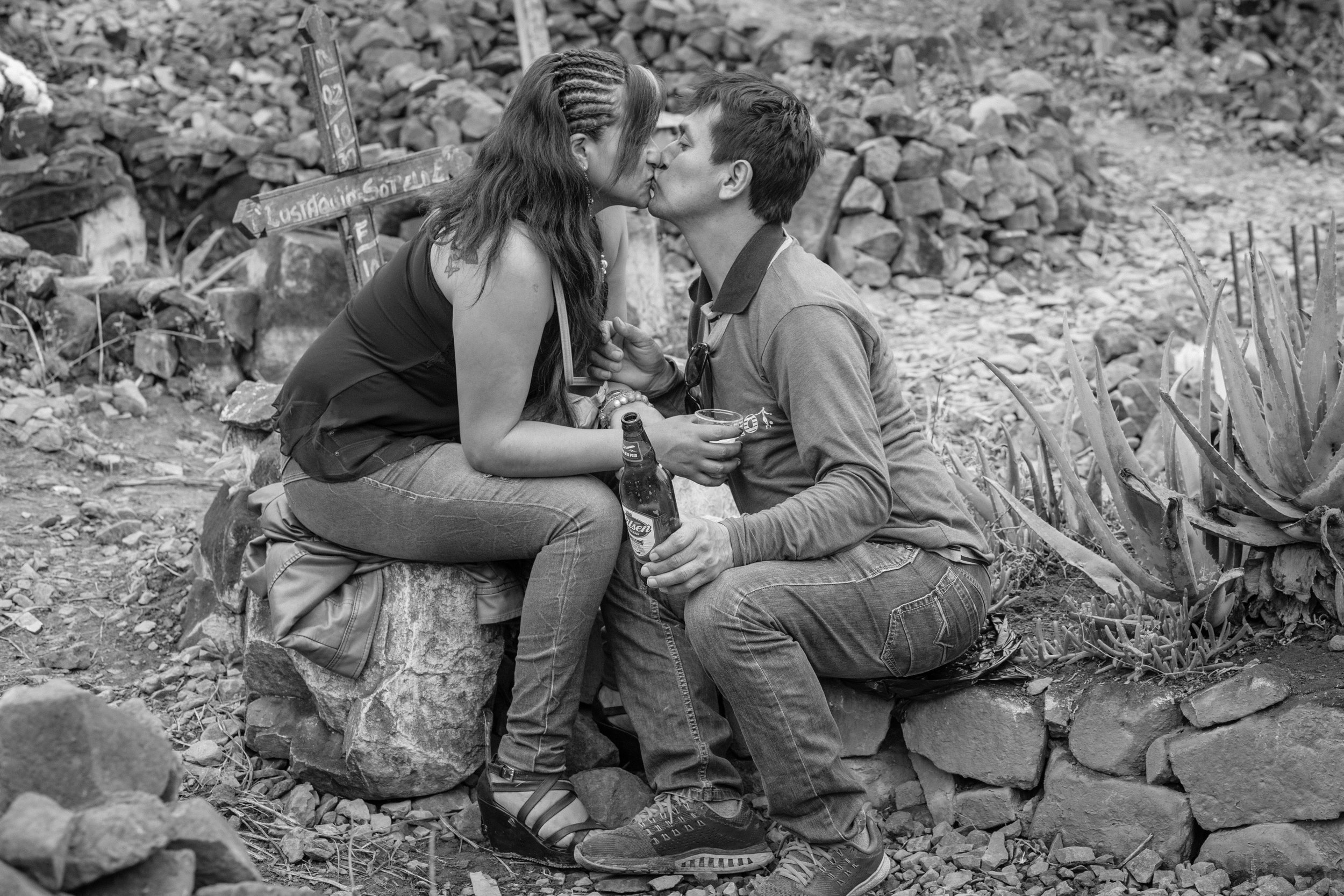 Ffotogallery Platform Instagram Takeover by Geraint Rowland - A couple share a tender moment at a cemetery in Lima on the Day of the Dead.
