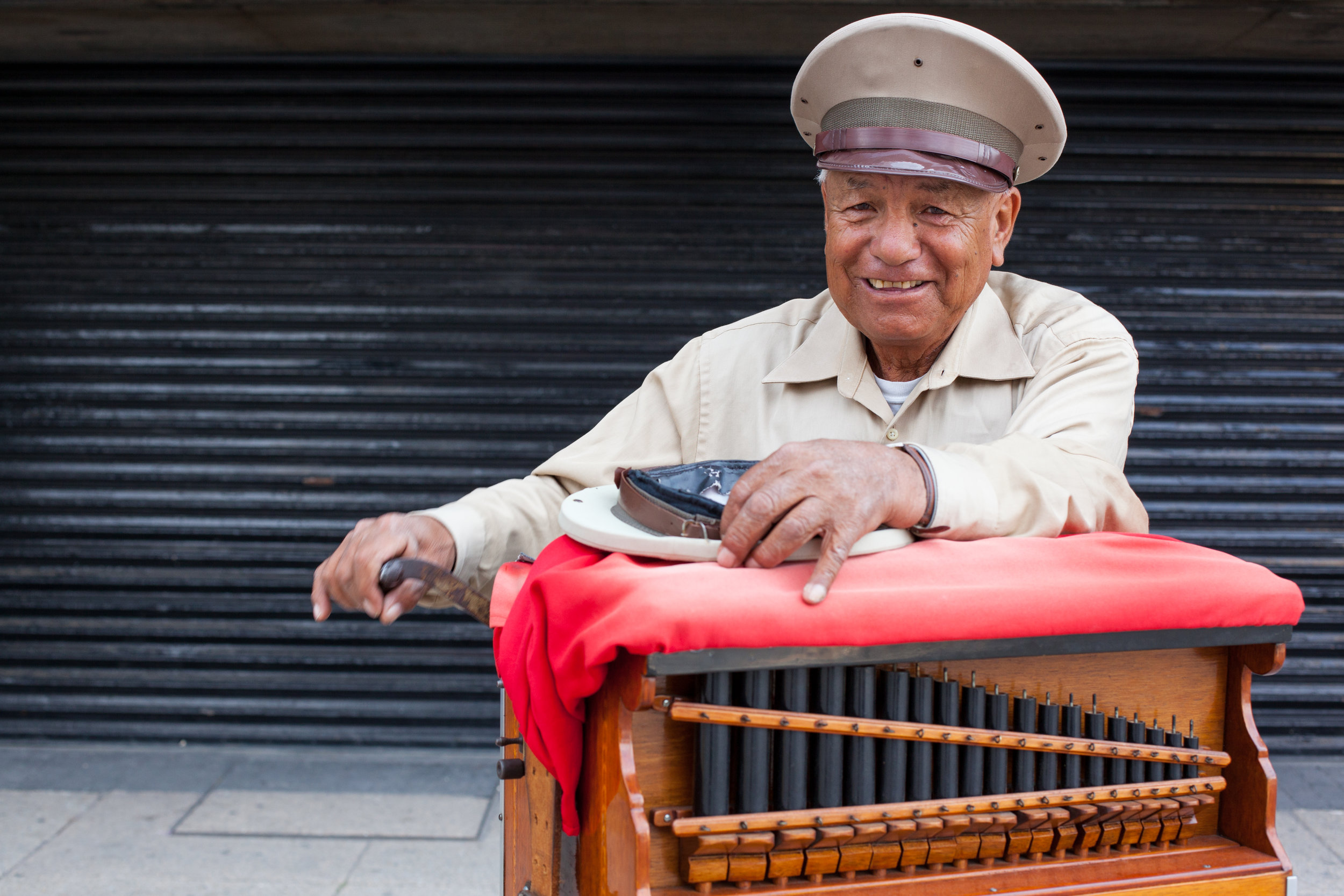 An environmental portrait taken in Mexico City of one of it's many Organ Grinders.
