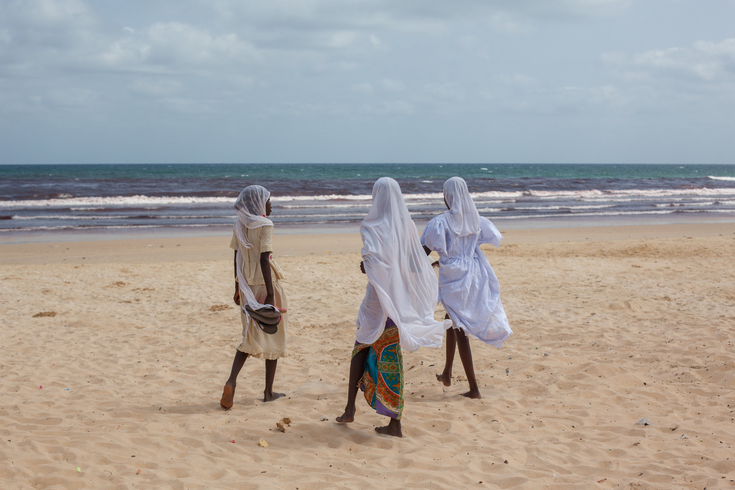 Muslim Girls on a beach in Senegal.