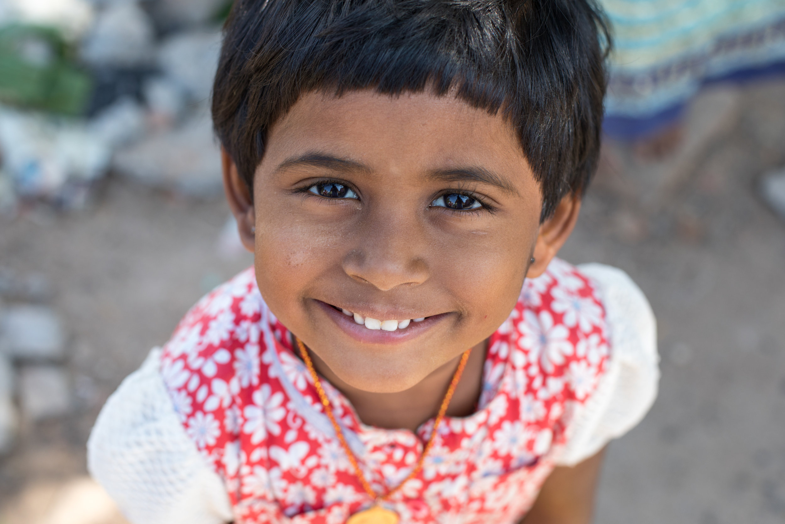 Portrait of a smiling Indian girl in Madurai.