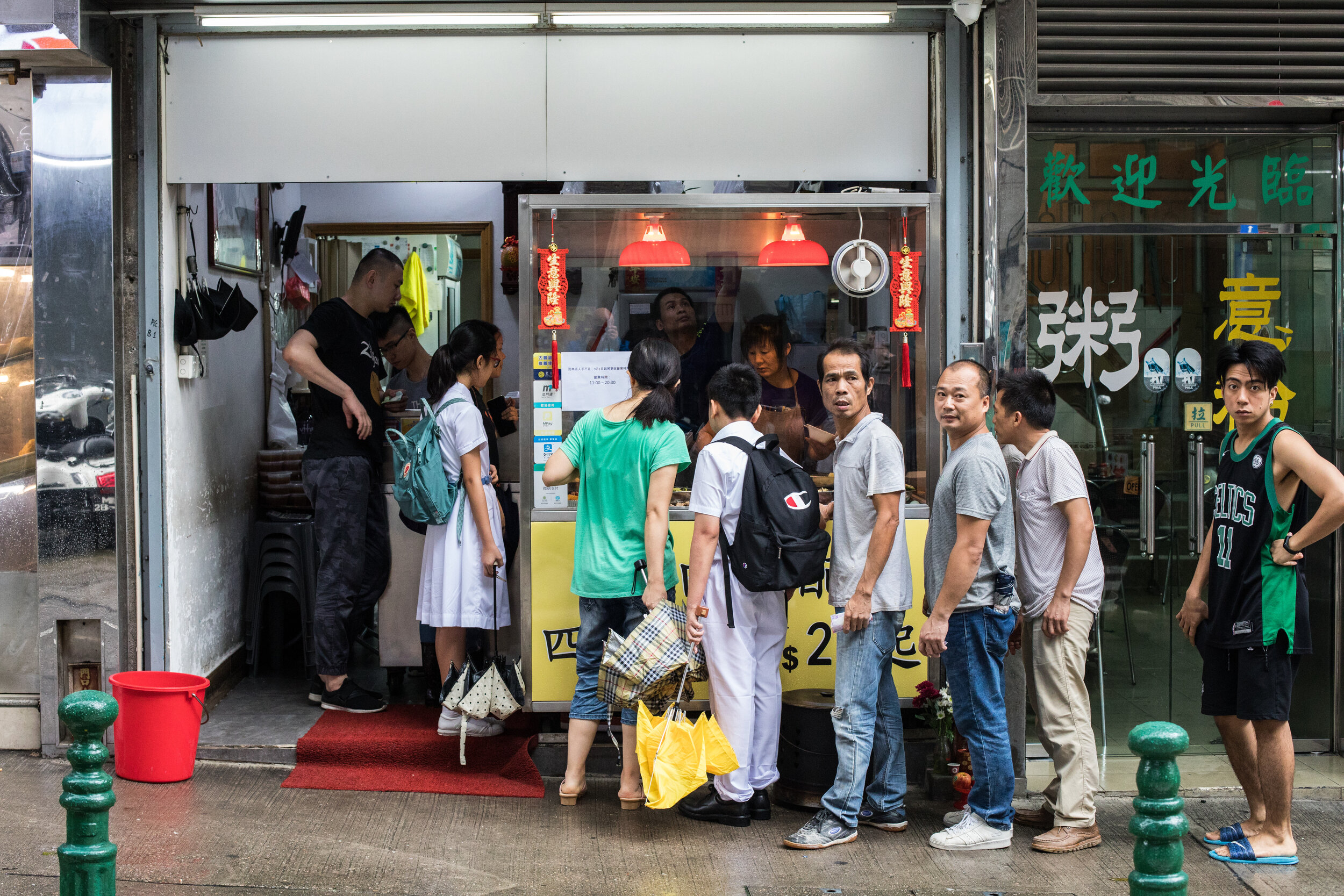 Locals queue for food in the centre of Macau.