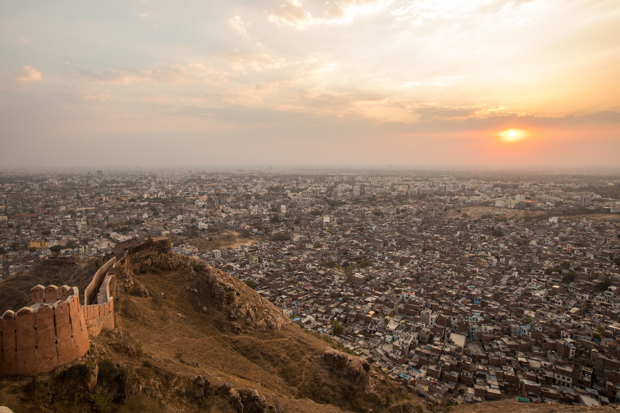 The sun sets over the city of Jaipur, also referred to as the Pink City in Rajasthan, India.