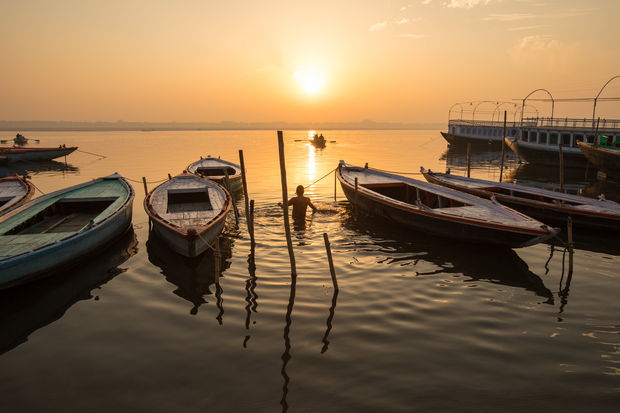 Sunrise over the iconic River Ganges in Varsnasi, India.