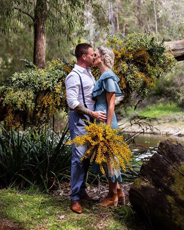 {FEATURED} Wattle Inspired Vow Renewal ⠀⠀⠀⠀⠀⠀⠀⠀⠀
I'm so honoured to have been a part of this stunning vow renewal set amongst the stunning backdrop of @stonebarn in Pemberton that's been featured in @polkadotbride. Driving down the pocketed gravel drive you'd never know this serene truffle farm was hiding away. ⠀⠀⠀⠀⠀⠀⠀⠀⠀
Emi &amp; Steve wore blues that contrasted with THAT wattle bouquet and backdrop designed by @duoeventscreativestudio and read vows from custom marsala and mustard-yellow books by @laladesignperth before sitting down for a feast... but that will come next (along with their transportation!). ⠀⠀⠀⠀⠀⠀⠀⠀⠀
@polkadotbride feature: https://www.polkadotbride.com/2019/08/wattle-filled-country-vow-renewal-inspiration ⠀⠀⠀⠀⠀⠀⠀⠀⠀
Epic Team: 
Photography: @mrsgardinerphoto 
Design, Styling, Florals: @duoeventscreativestudio
Hair: @malihairandmua_
Makeup: @anniegiacomelmua
Dress: @mohicanstore
Stationery: @laladesignperth
Food: @thetapasman
Transport: @mrmustanghire
Venue: @stonebarn_