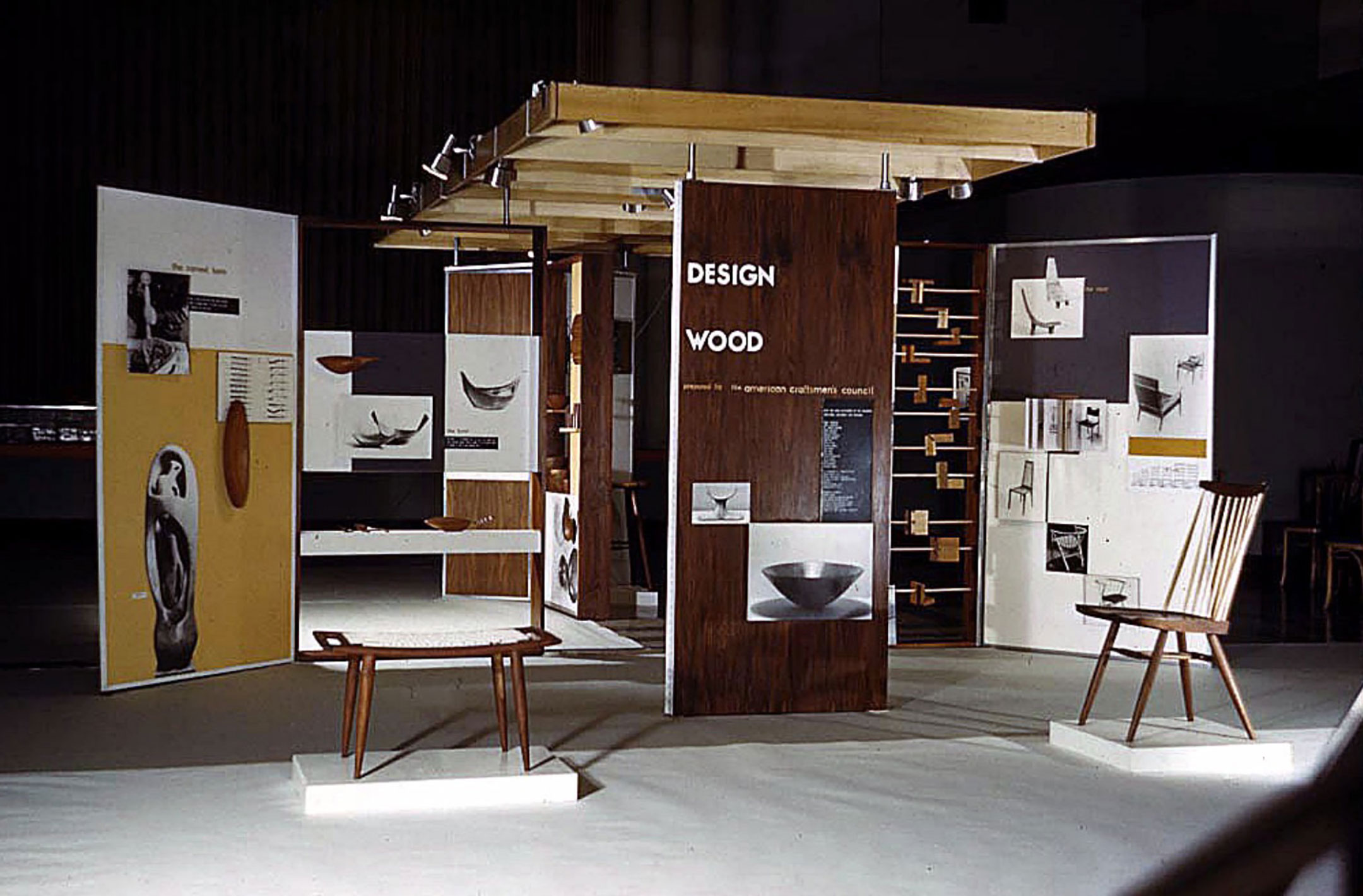 The 1957 Design Wood exhibit was conceived as an educational outreach program of the ACC. Emil’s bowls are visible in the back central table and panel. Courtesy of the American Craft Council.