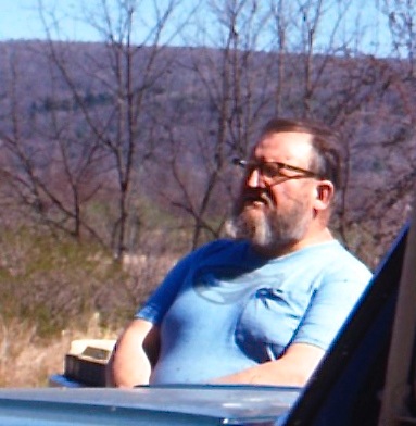 Emil Milan shown wearing his "Wood is Warm" t-shirt at Peter's Valley, c. 1970s.