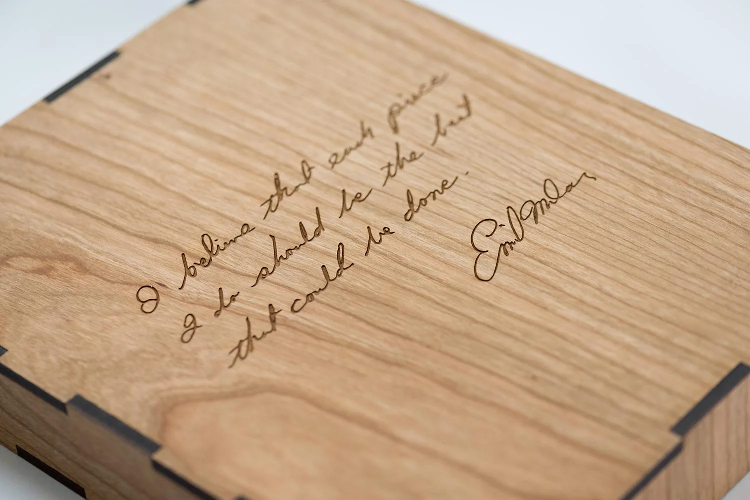 The back of the slip case is adorned with a laser-etched Emil Milan quote.