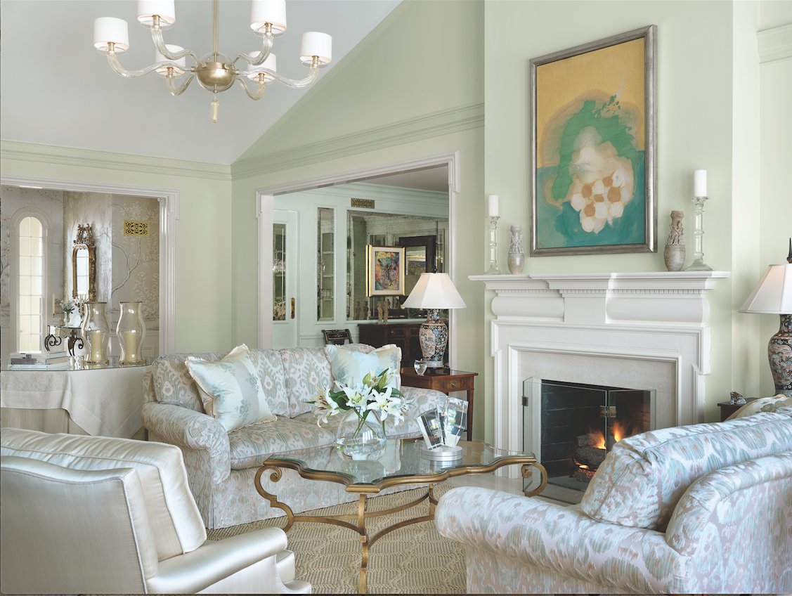 A rare Helen Frankenthaler painting is a stunning focal point in the living room. A substantial chandelier of Murano glass is perfectly scaled to the dramatic 21-foot ceiling. 