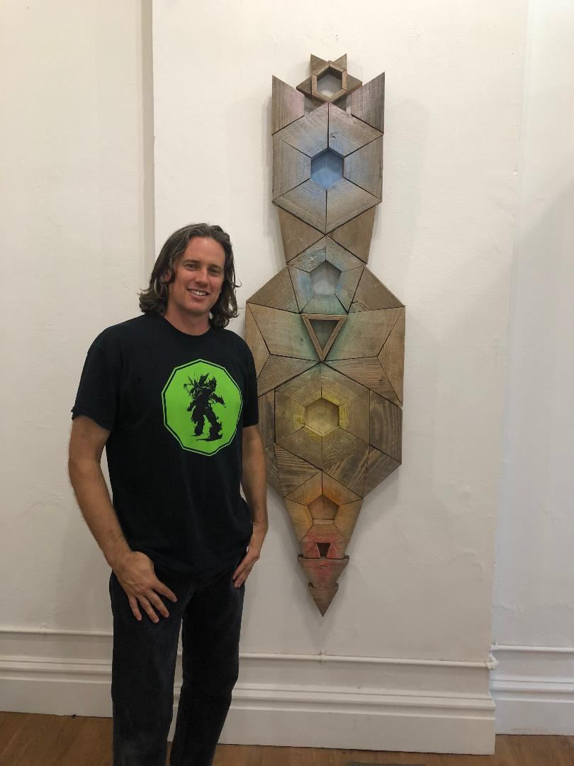 Cherokee Street Gallery founder and artist, Benjamin Lowder, exhibiting his artwork. 