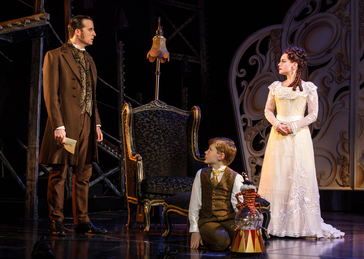 Raoul, Gustave and Christine arrive in New York from Paris for what they think will be Christine’s star role in a Manhattan Opera House.