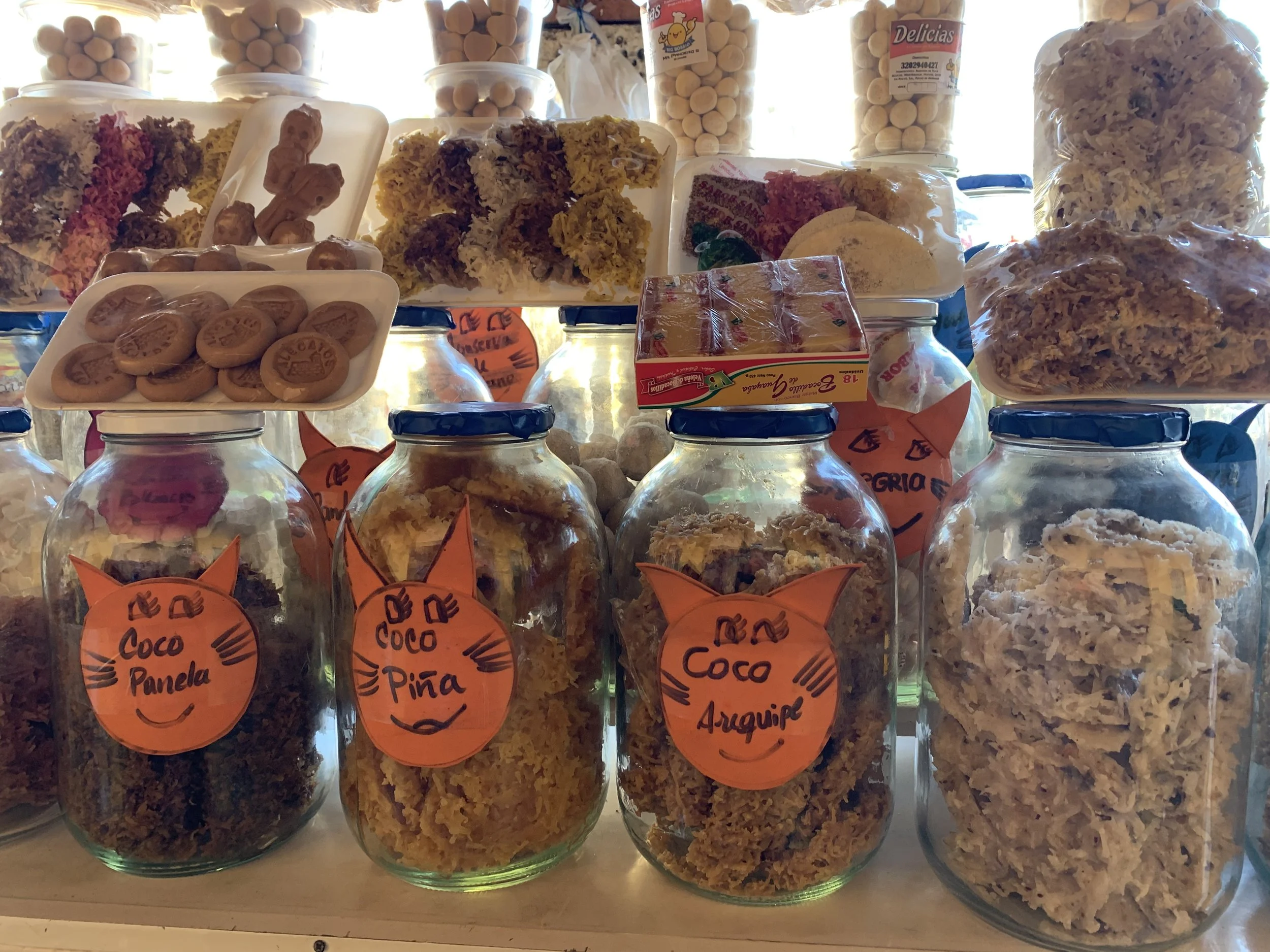 A sampling of homemade dried and sugared fruits in different flavors, on sale in the marketplace near La Torre del Reloj (Clock Tower Gate).