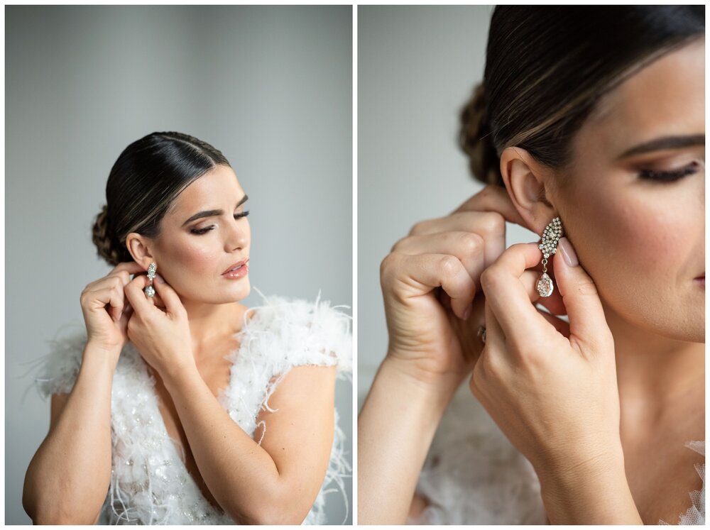 bride putting on earrings at Vizcaya Museum and Gardens