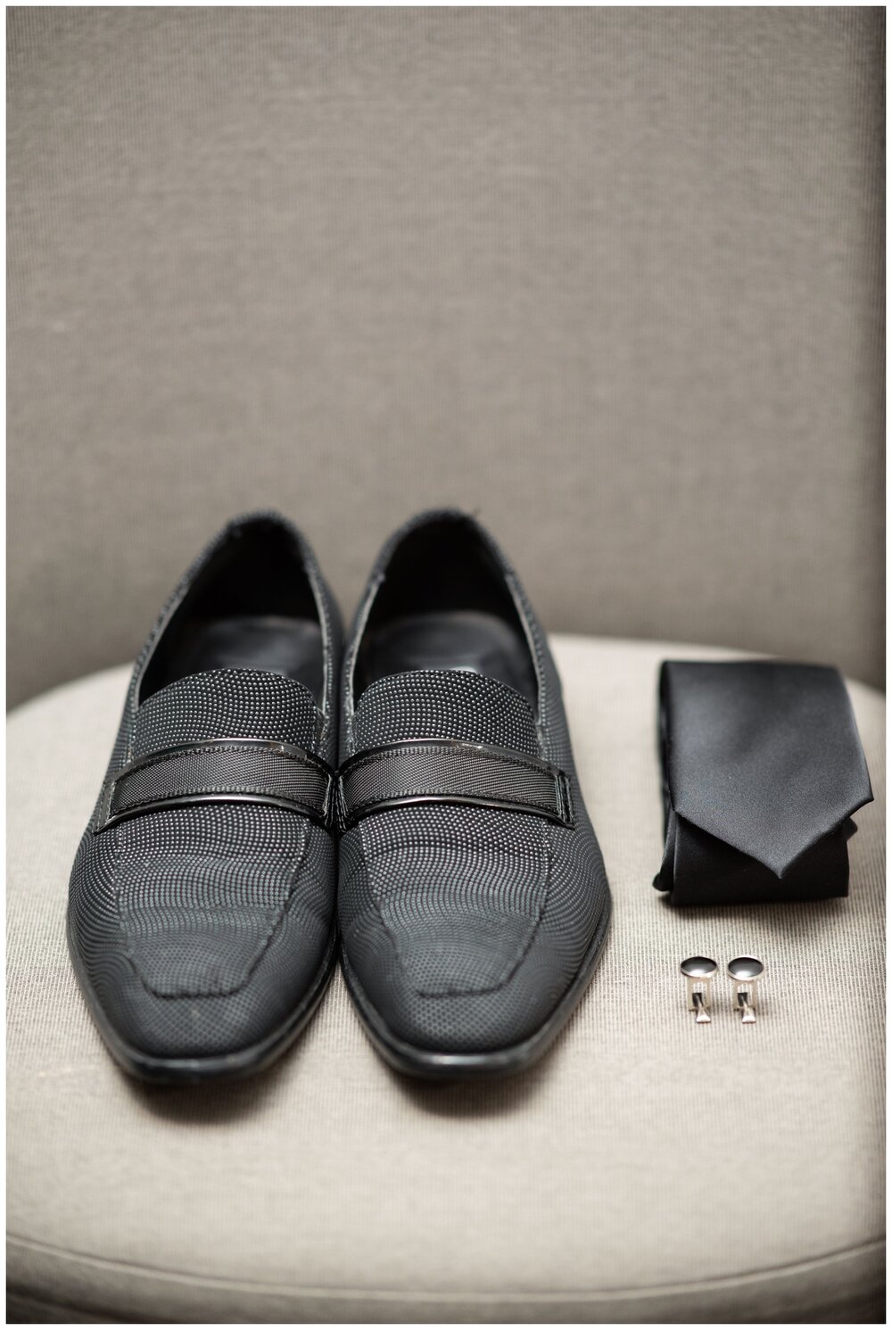 black shoes and tie groom detail flatlay