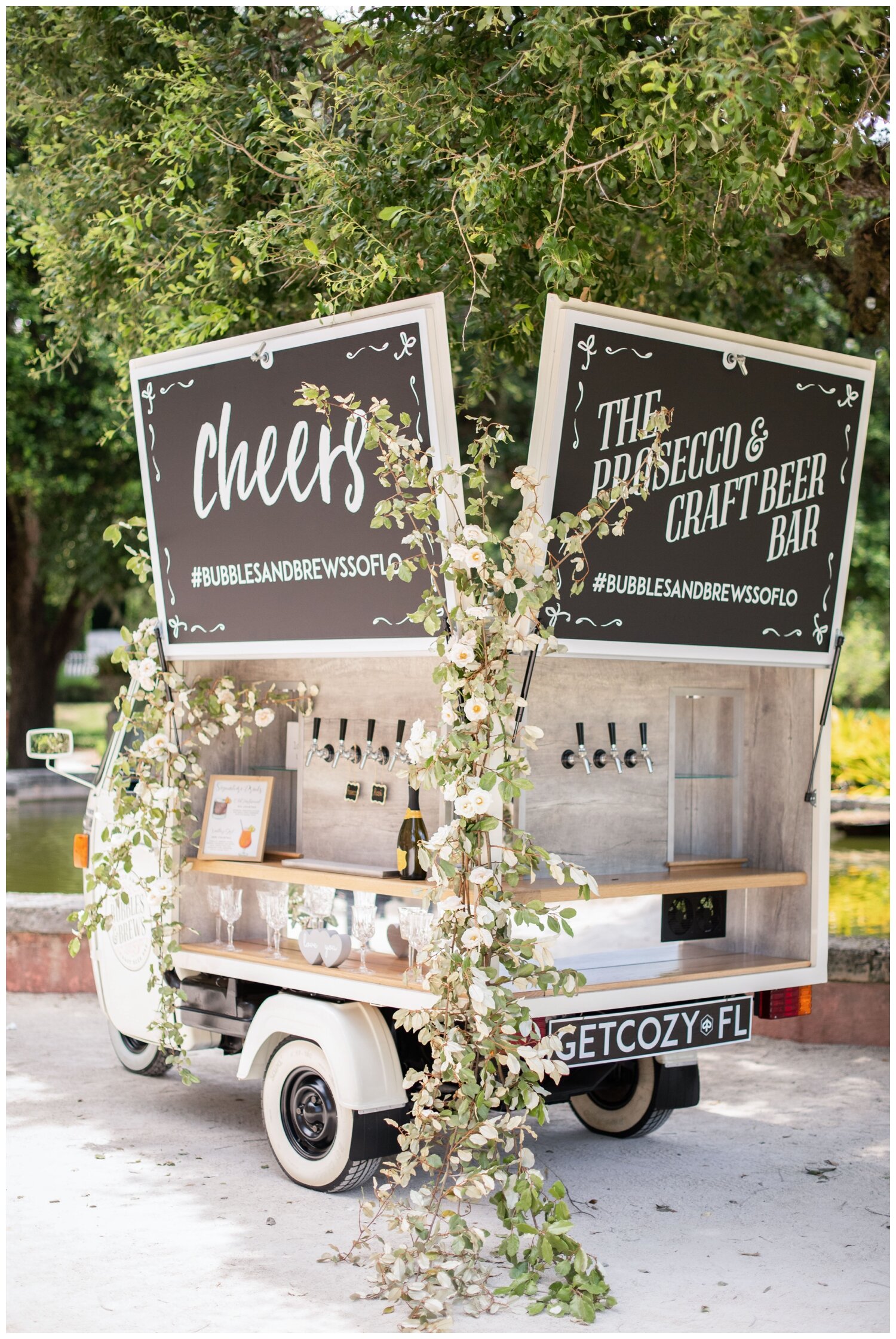 bar cart with cheers signage