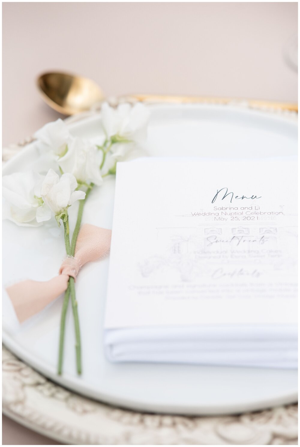 white place setting with white menu card
