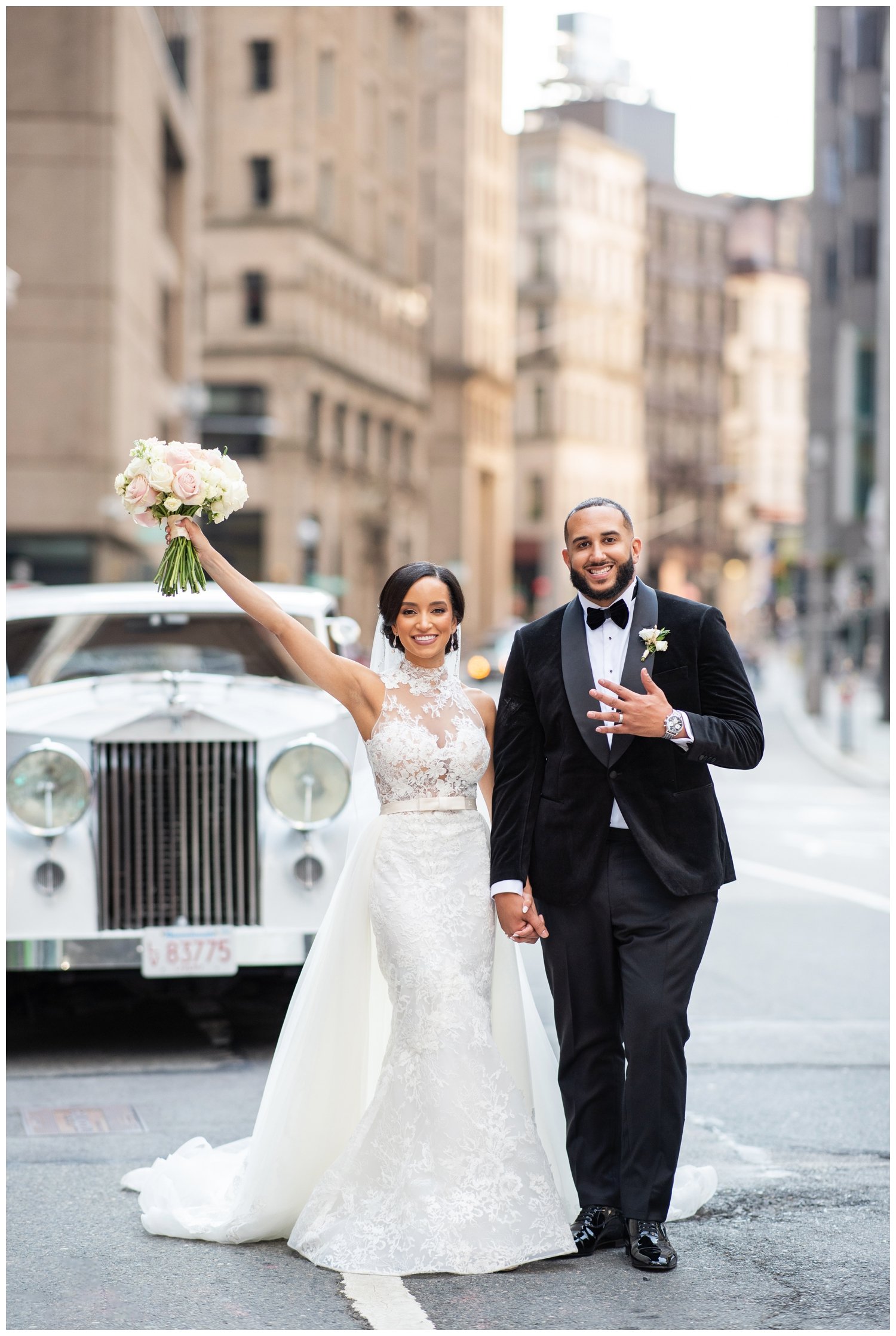 bride and groom celebrating portrait after Fairmont Copley Plaza wedding ceremony in Boston