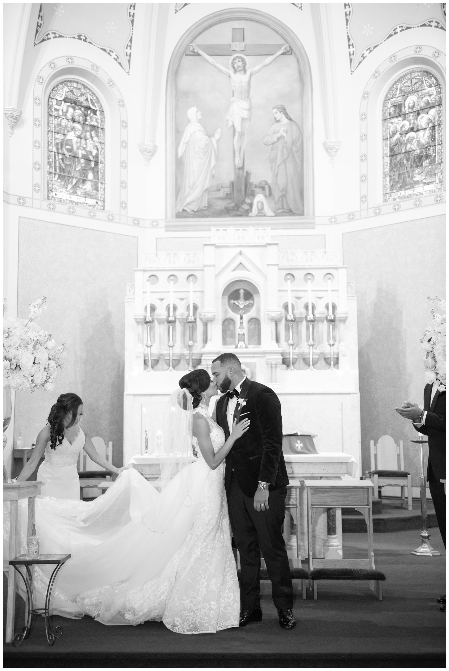 ceremony kiss at Holy Family Parish for Fairmont Copley Plaza wedding