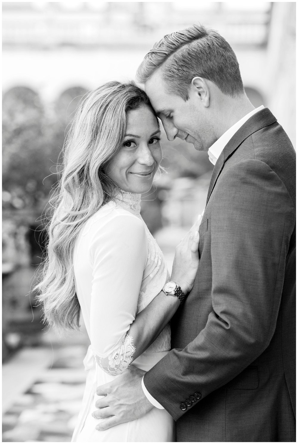 engaged couple nuzzling for black and white engagement photo  Miami Wedding Photographer