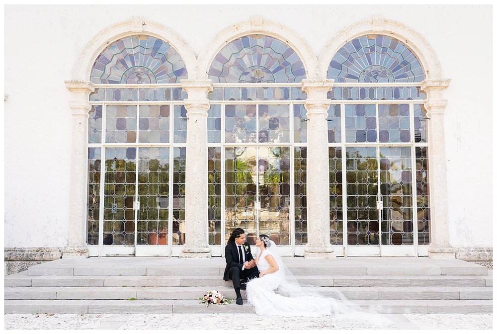 Miami wedding photographer bride and groom portrait in front of Vizcaya Museum and Gardens steps