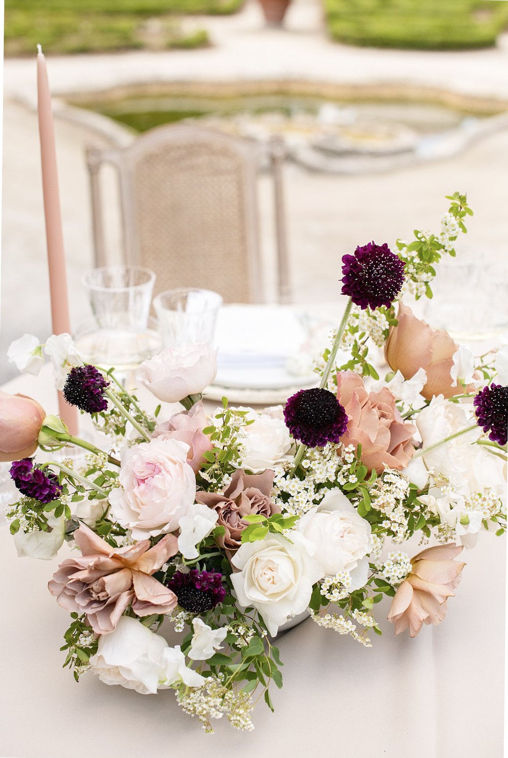 blush and burgundy floral centerpiece Miami wedding photographer