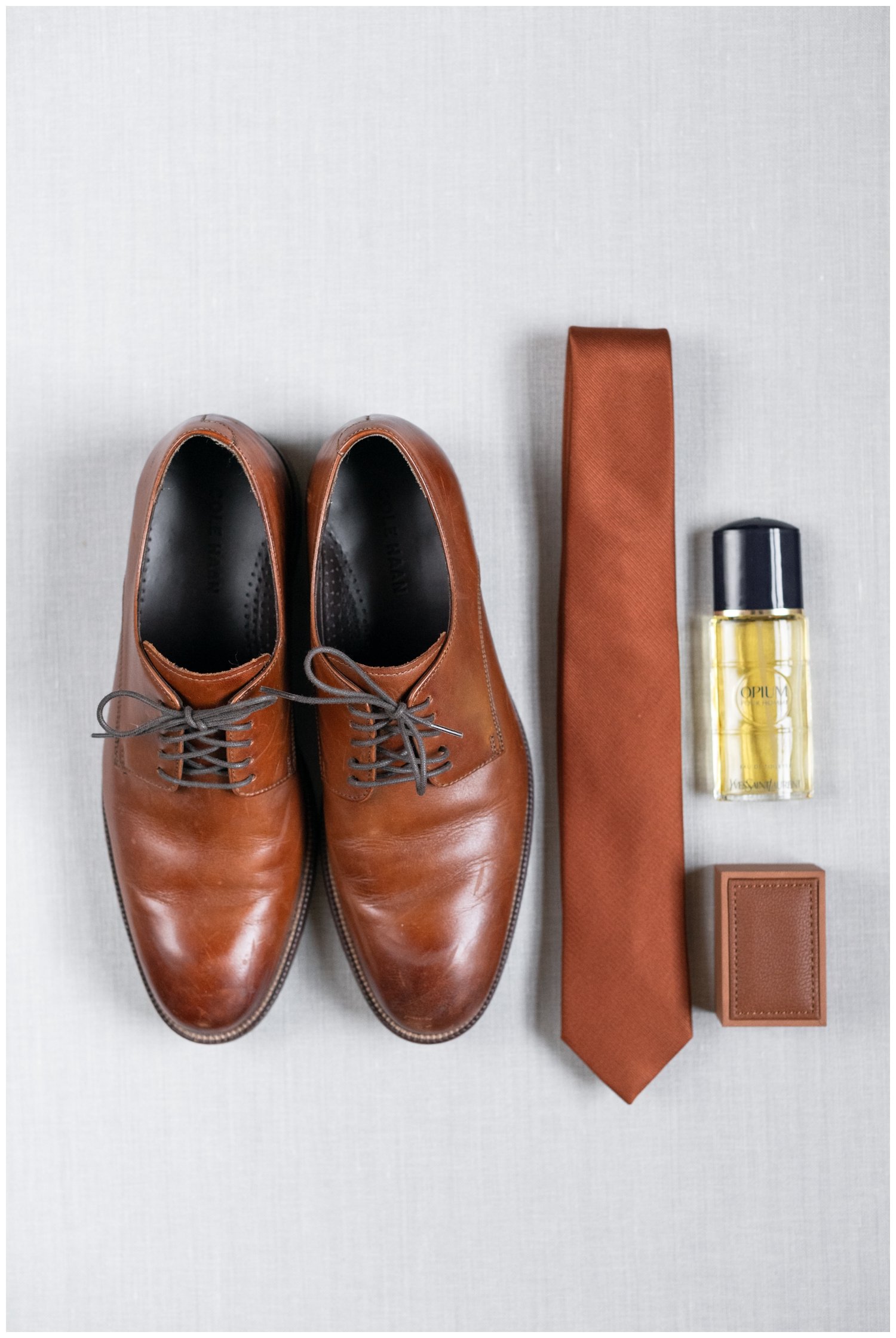 grooms shoe tie cologne bottle detailed image Boston wedding photographer