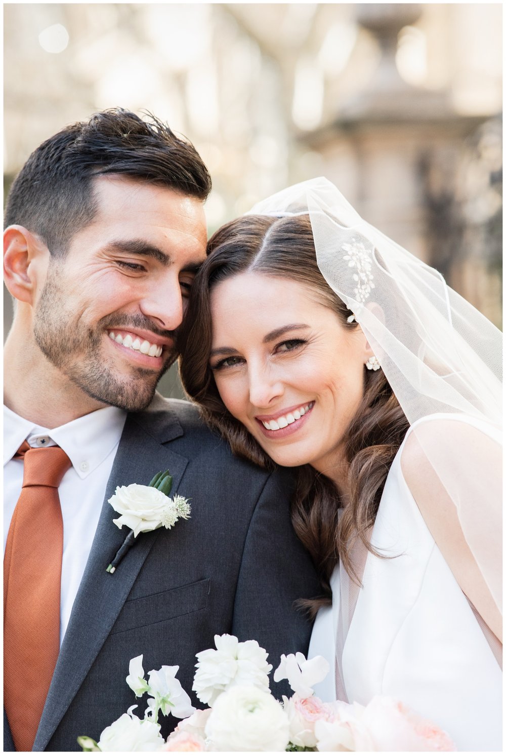 close up image bride and groom smiling