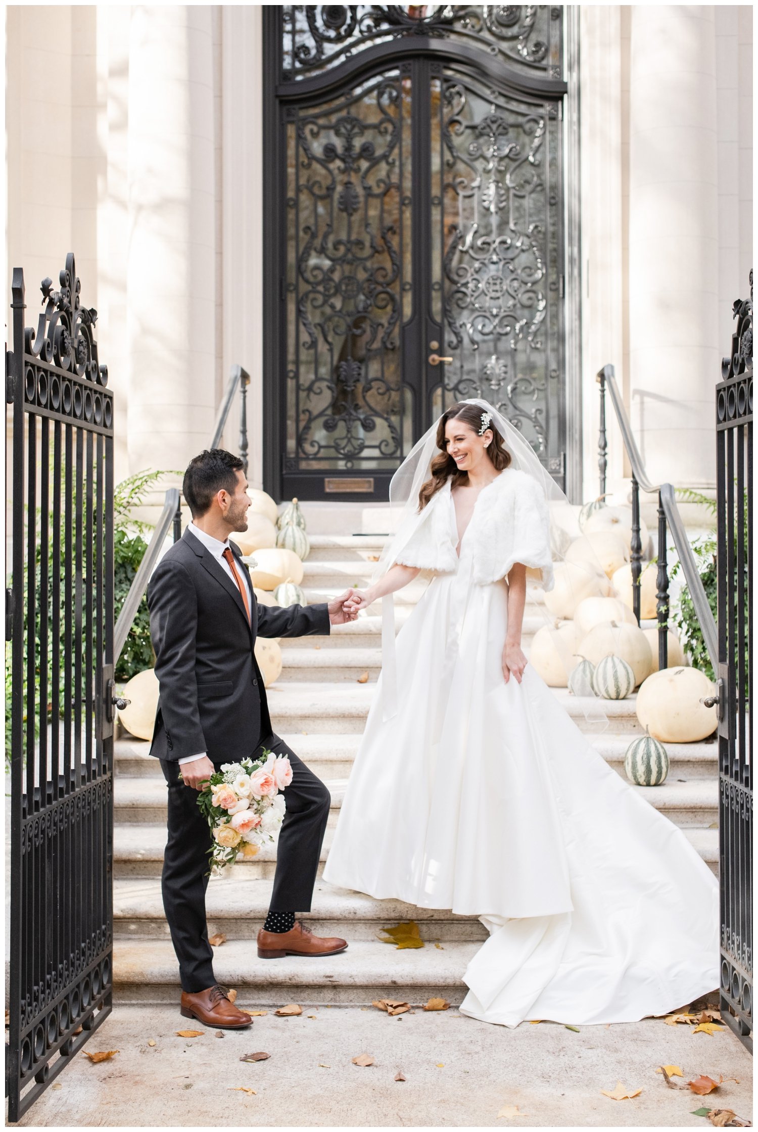 bride and groom on steps The Hampshire House Boston wedding photographer