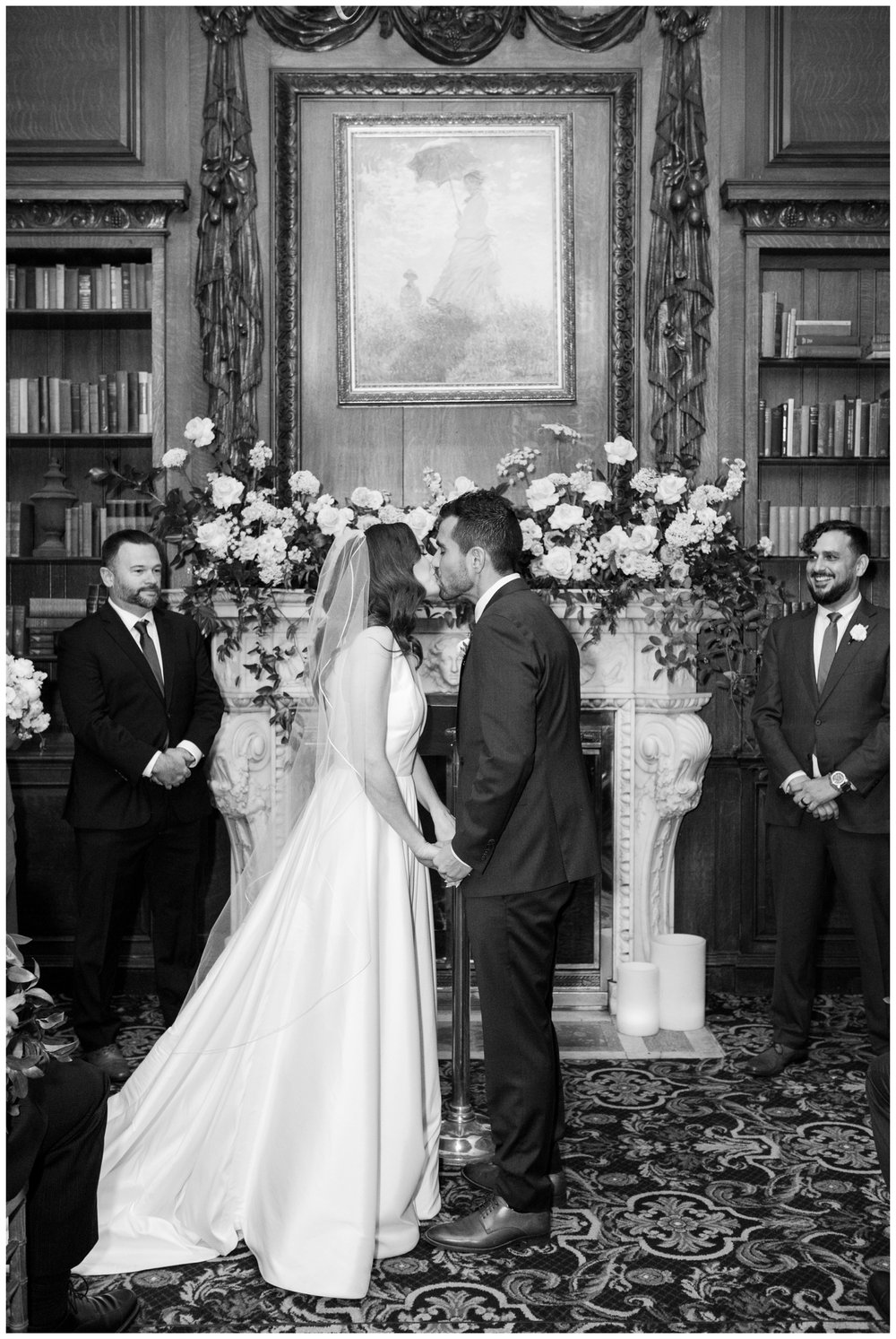 bride and groom kissing during Hampshire House Boston wedding ceremony