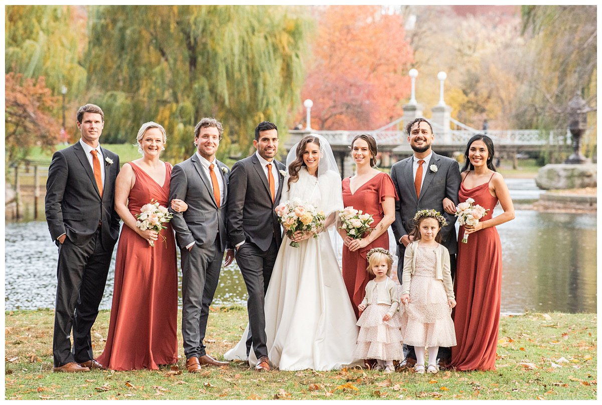 bride and groom with bridal party outdoors Boston wedding photographer