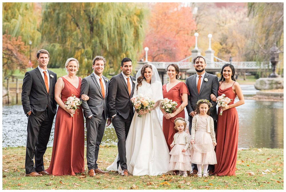 bride and groom with bridal party outdoors Boston wedding photographer