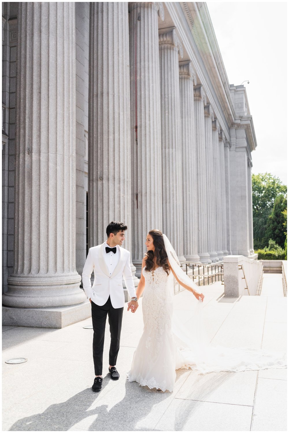 bride and groom walking holding hands outside Museum Fine Arts Boston Granite Links wedding