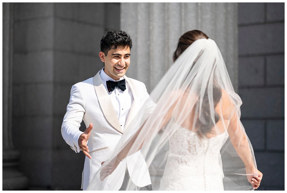 groom reacting with emotion to bride during Granite Links wedding first look
