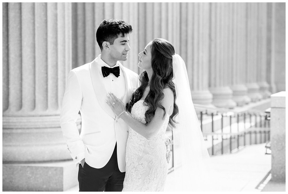 bride and groom portrait outdoors on steps at Museum Fine Arts Boston