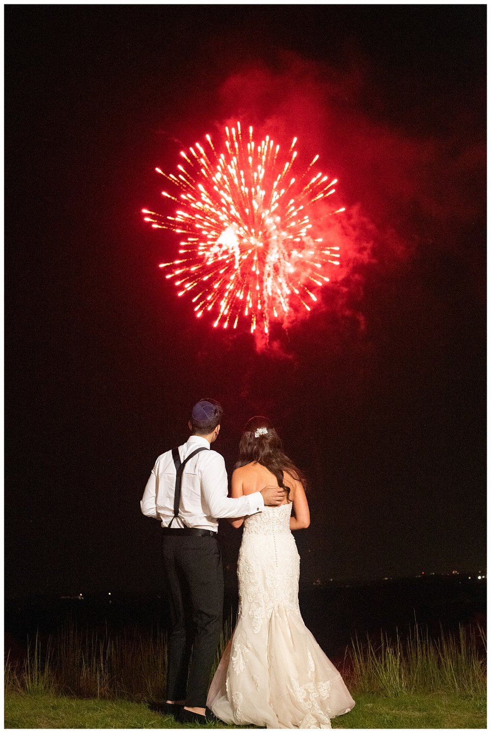 bride and groom and guest celebrating during fireworks Granite links wedding