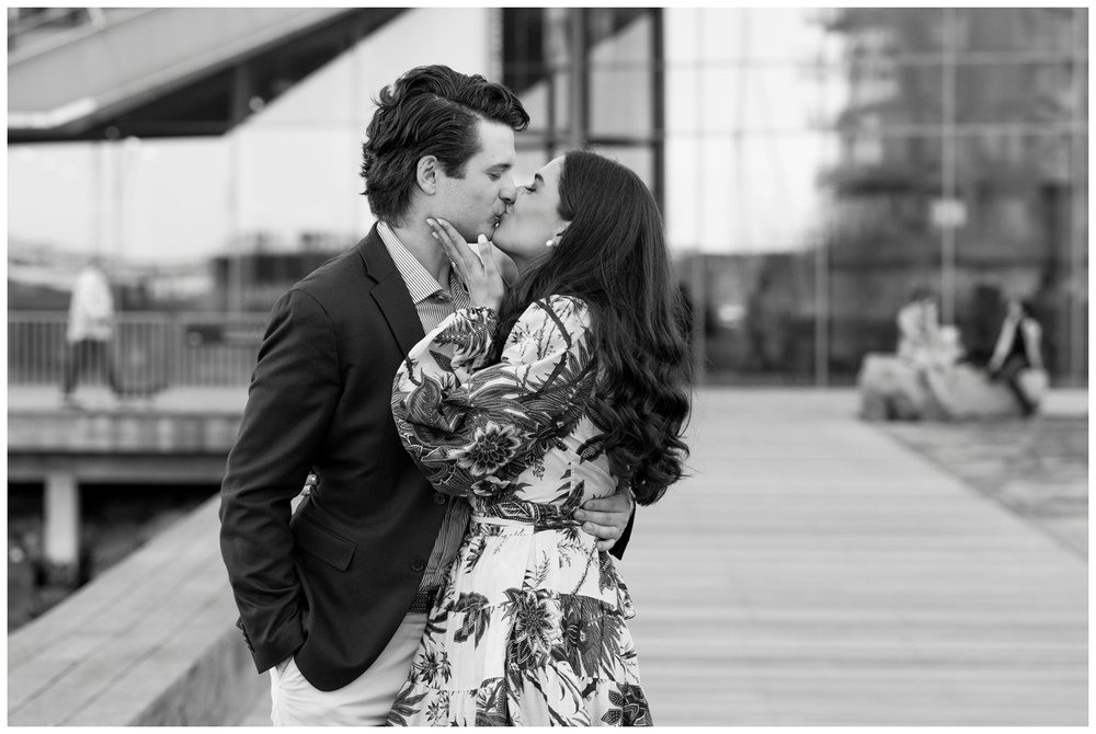 black and white image of couple kissing during Boston Seaport engagement session