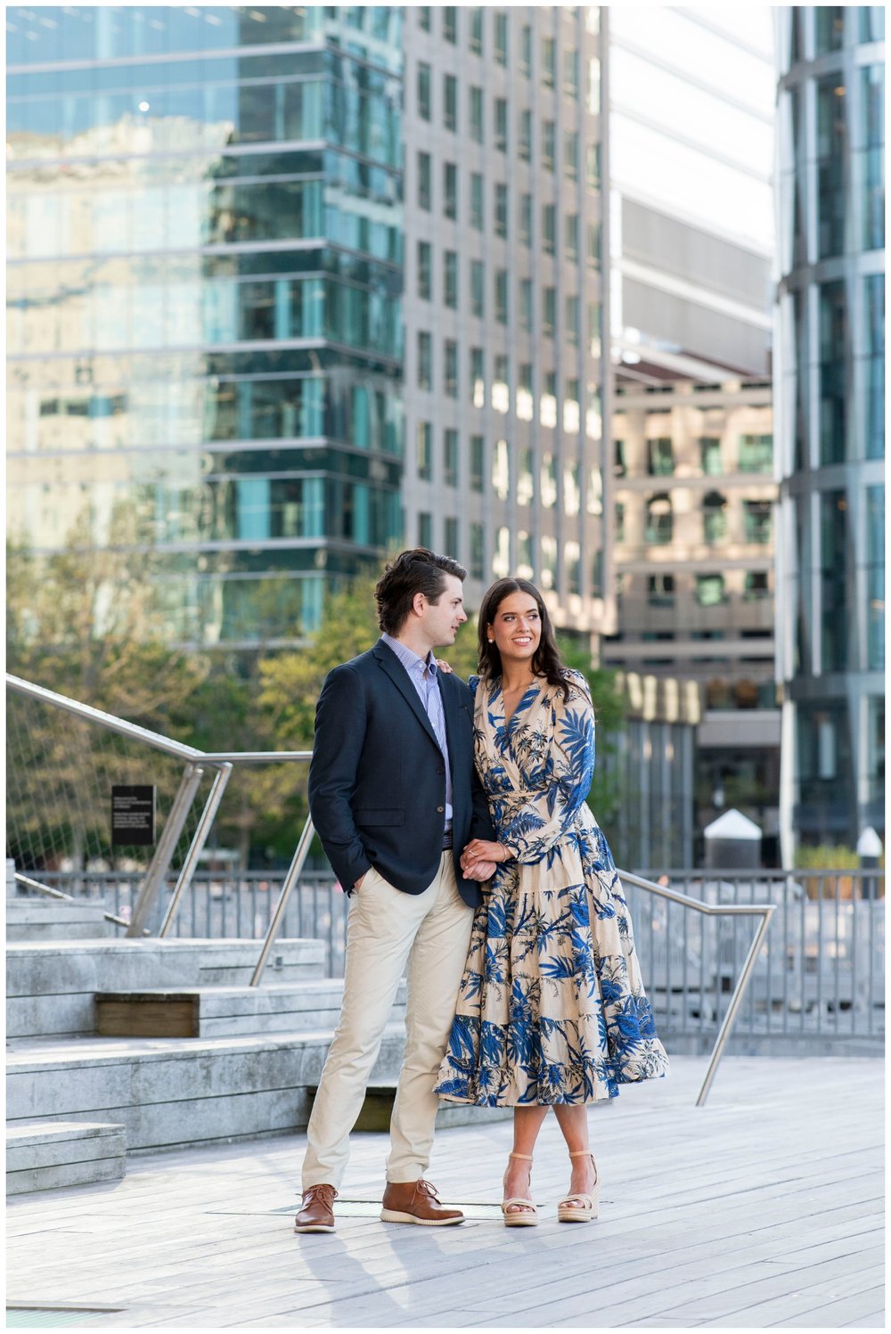 engaged couple holding hands for Boston Seaport engagement session