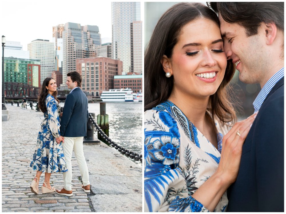 engaged couple in navy and cream smiling for engagement session at Boston Seaport