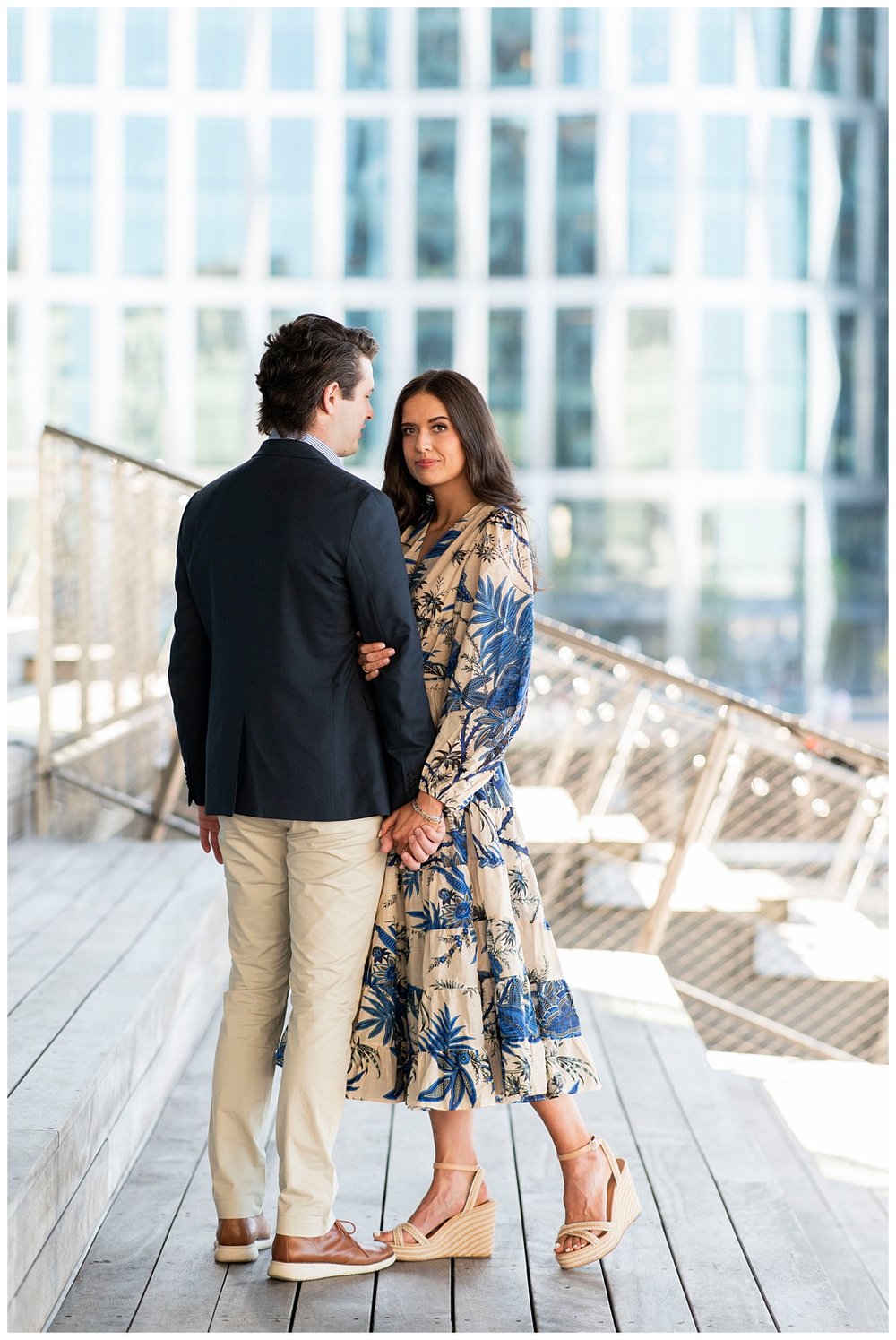 engaged couple standing in front of ICA Museum for Boston Seaport engagement session