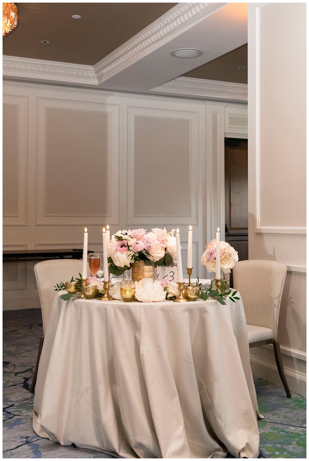 sweetheart table at Boston wedding reception with white linen