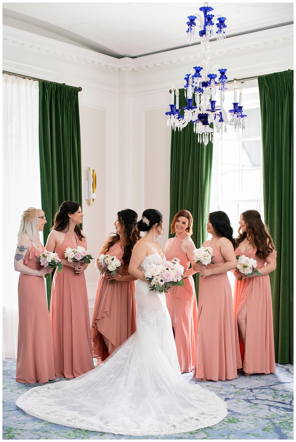 bridal party inside The Newbury Hotel wearing blush gowns