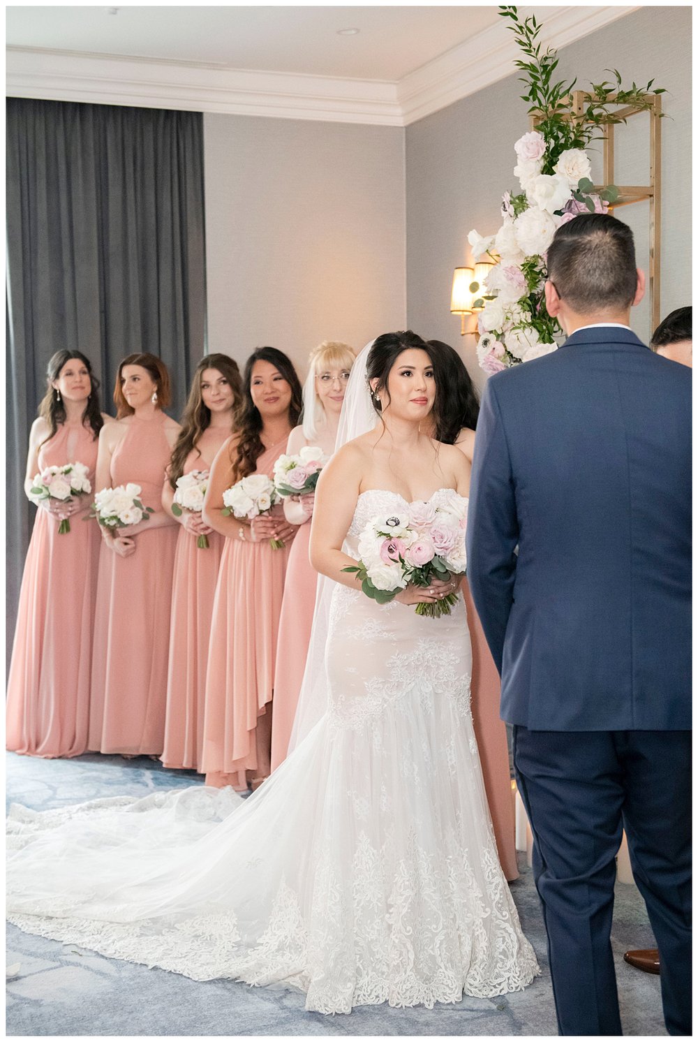 bride looking at groom during Newbury Hotel wedding ceremony