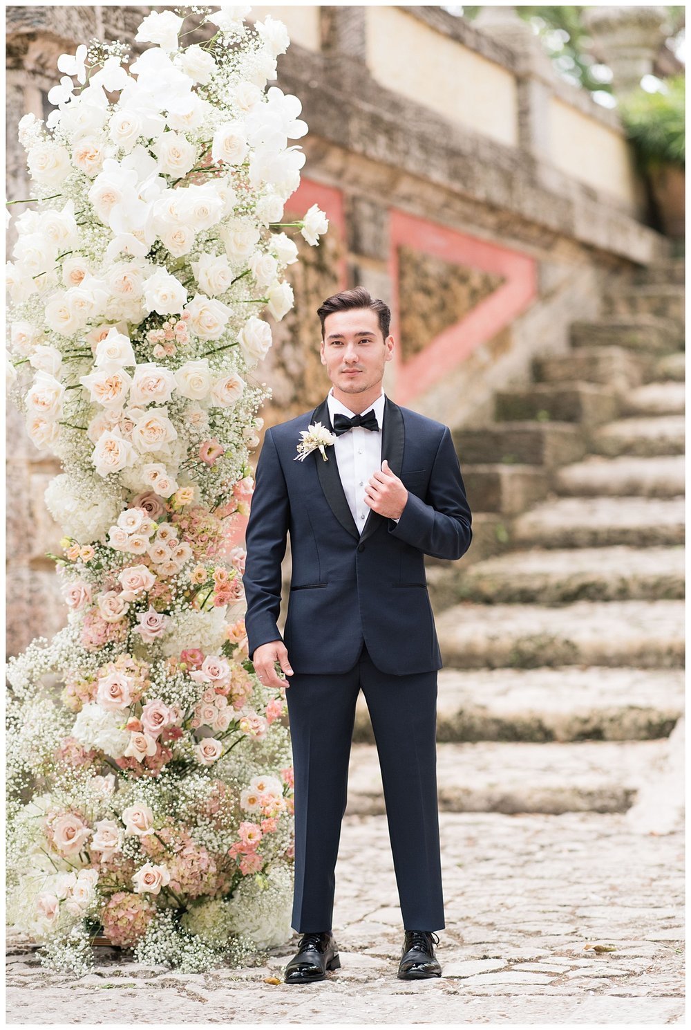 groom waiting for bride to walk down ceremony aisle